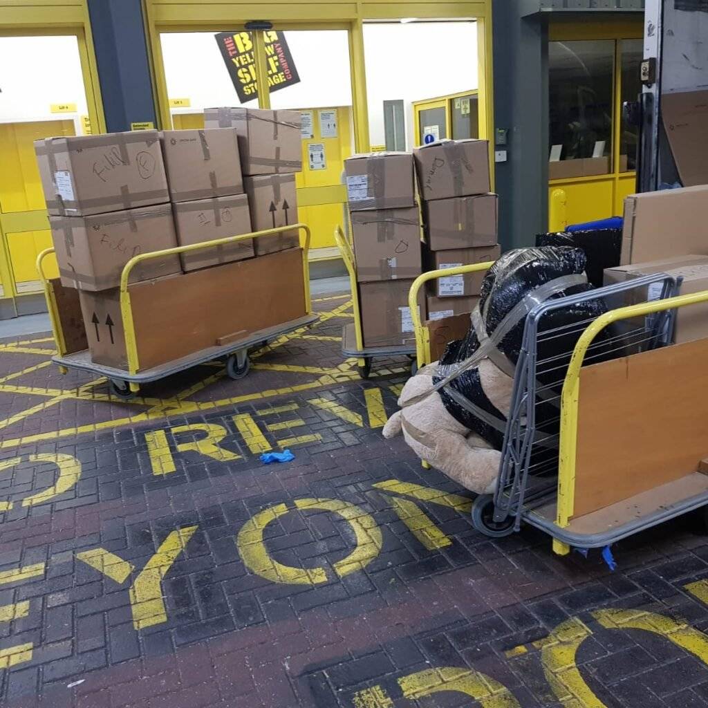 there is unloading of back stuff from the tracks into the storage unit